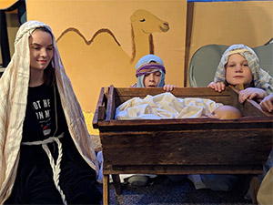 Children dressed in clothing typical of Israel during the time of Jesus.